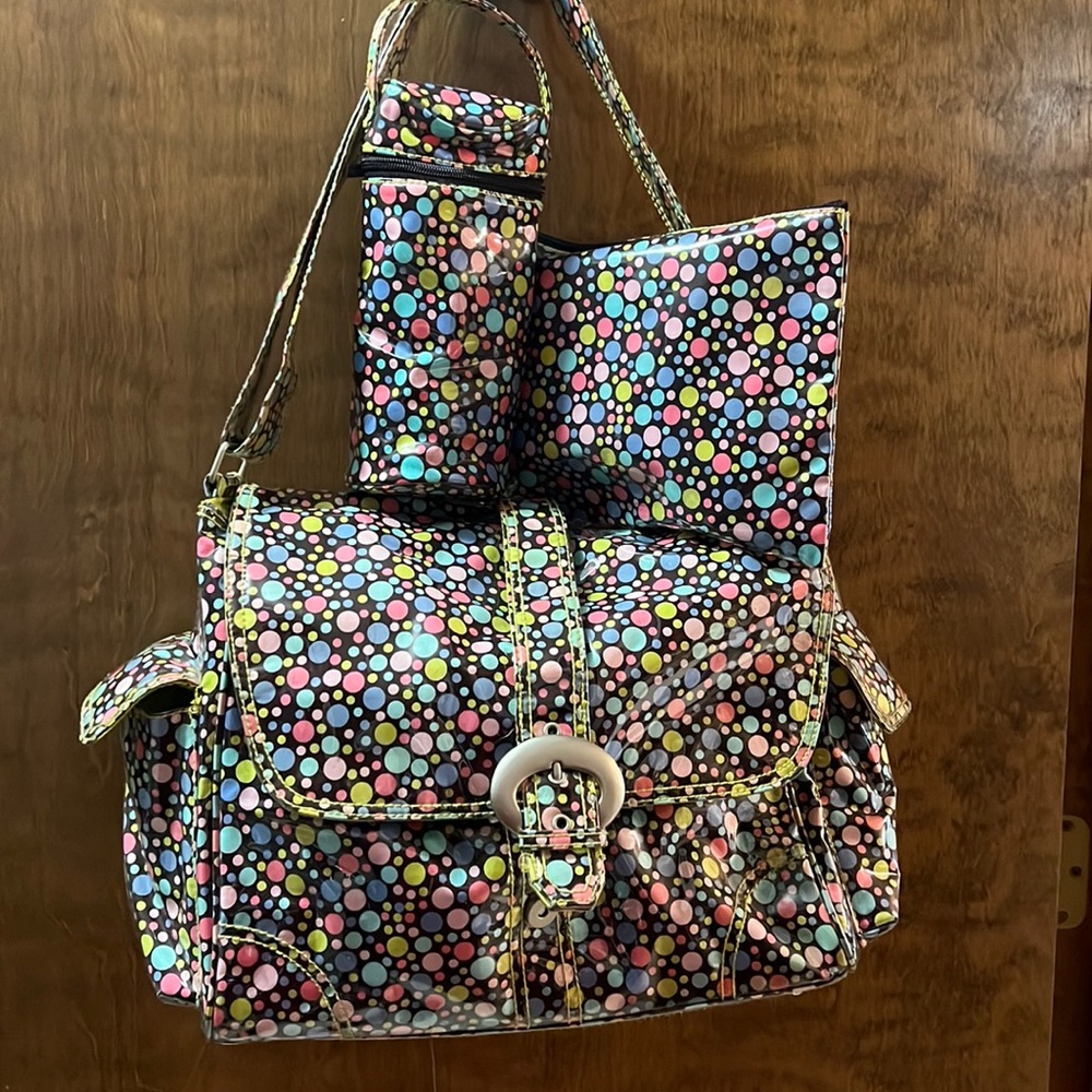 Kalen.com New Orleans diaper bag. Laminate exterior. Colorful polka dots